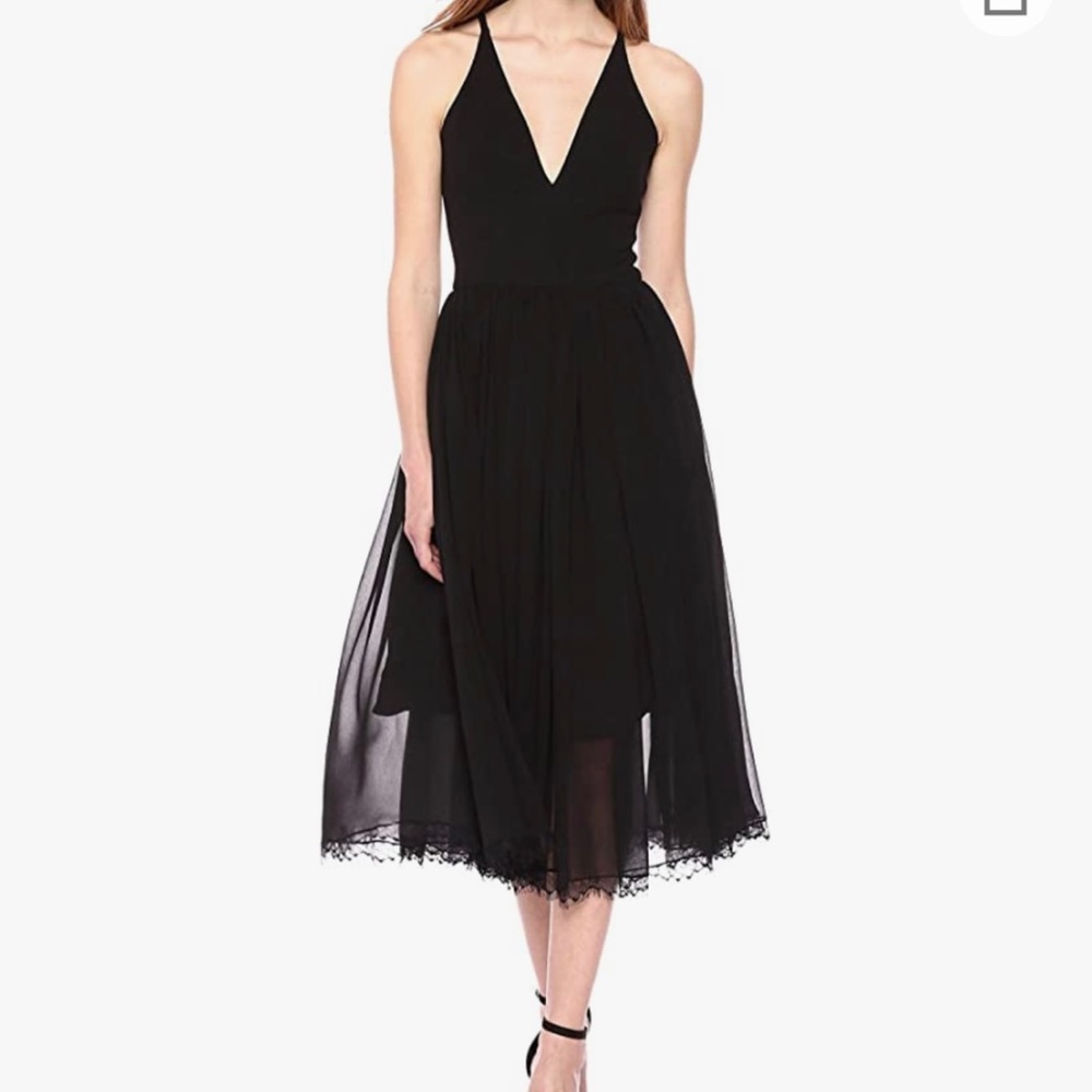 Never worn black dress by Dress the Population